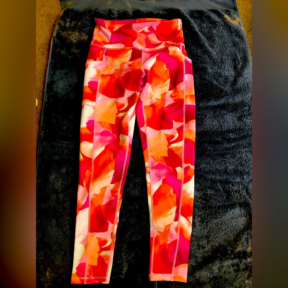 Pink, white, and orange leggings.